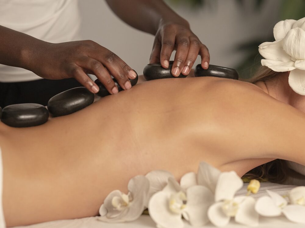Warm stones used in far-infrared deep tissue massage
